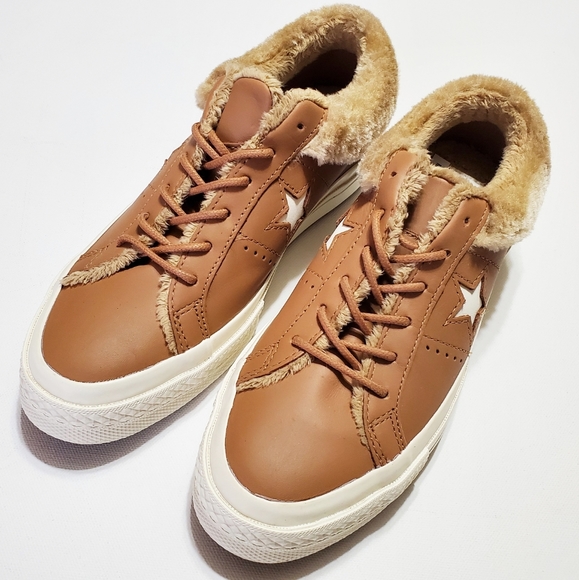 beige leather converse